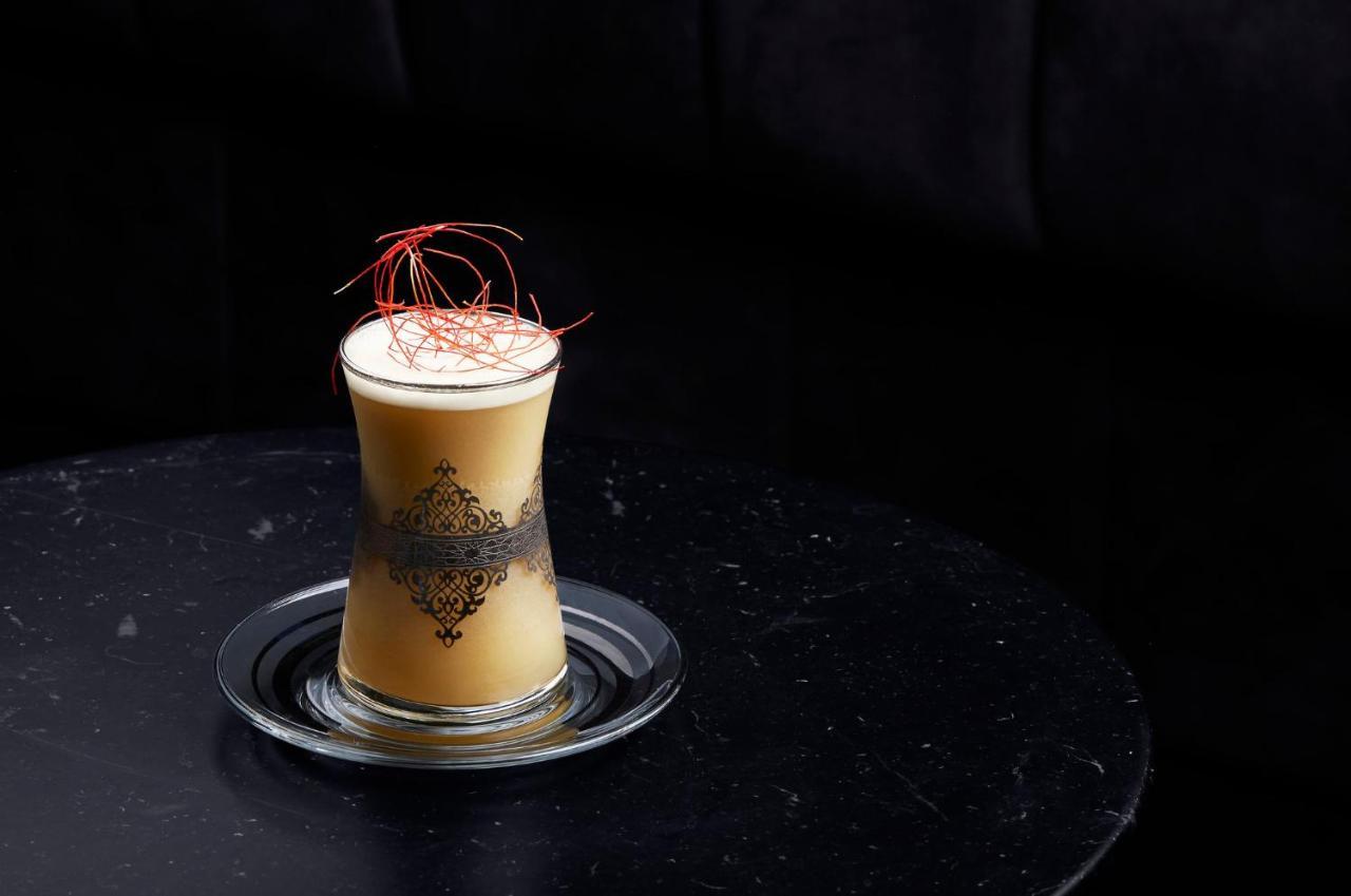 Abesq Doha Hotel And Residences, An Ihg Hotel Exteriör bild A glass of eggnog