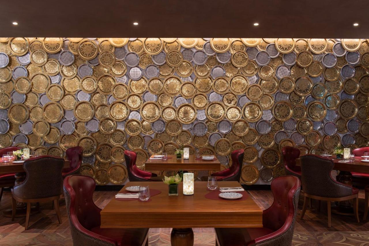 Abesq Doha Hotel And Residences, An Ihg Hotel Exteriör bild The interior of the restaurant