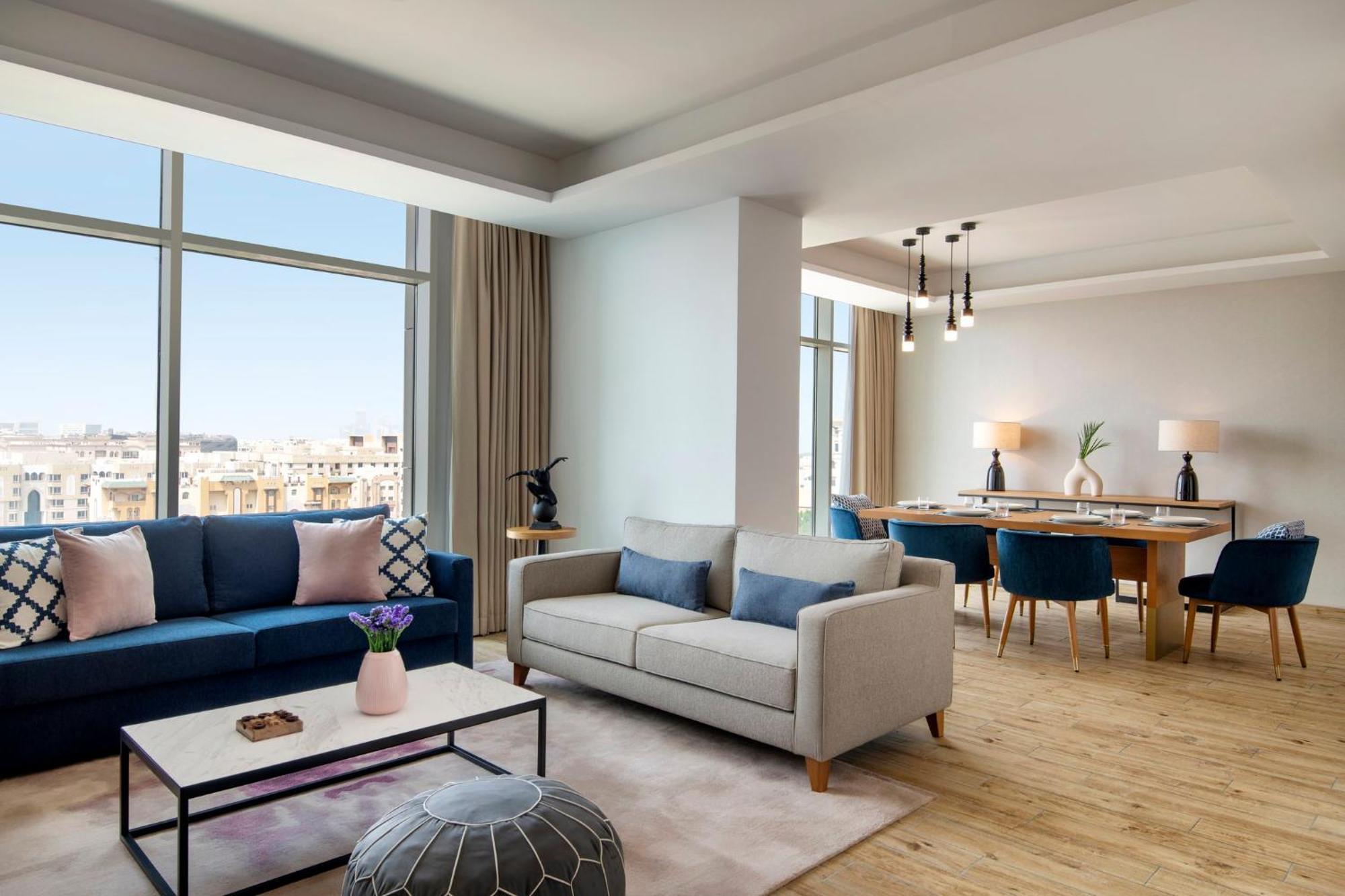 Abesq Doha Hotel And Residences, An Ihg Hotel Exteriör bild A living room at the hotel